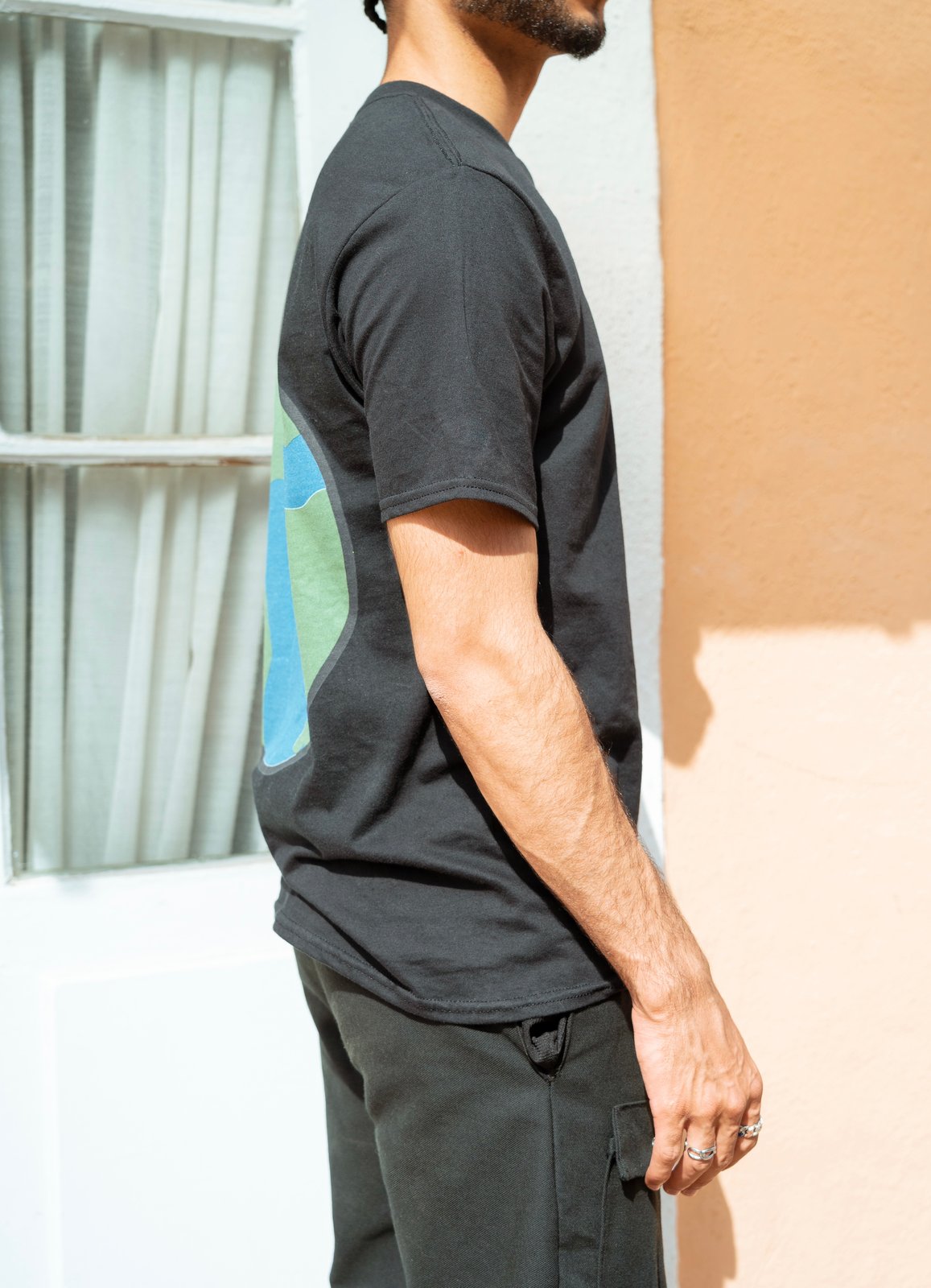 World black tee