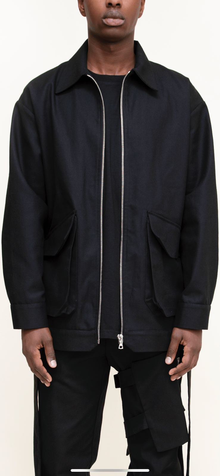 Black canvas work jacket .