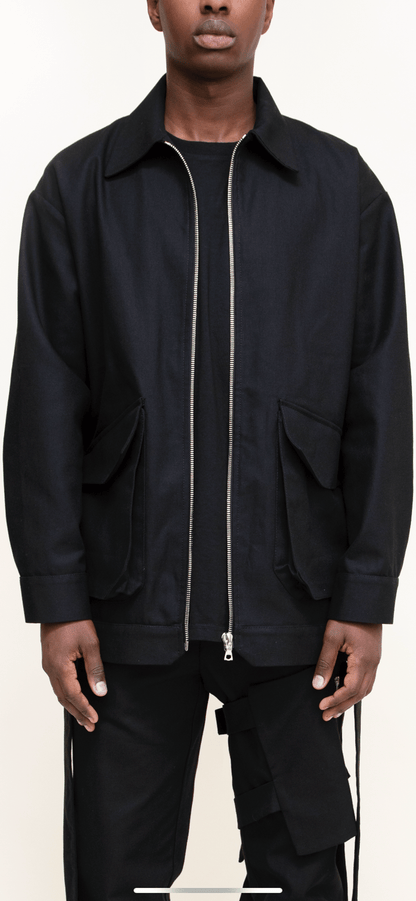 Black canvas work jacket .