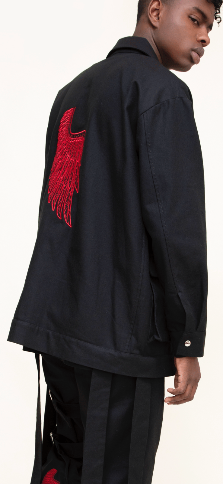 Black canvas work jacket .